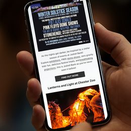 Phone in hand newsletter wide